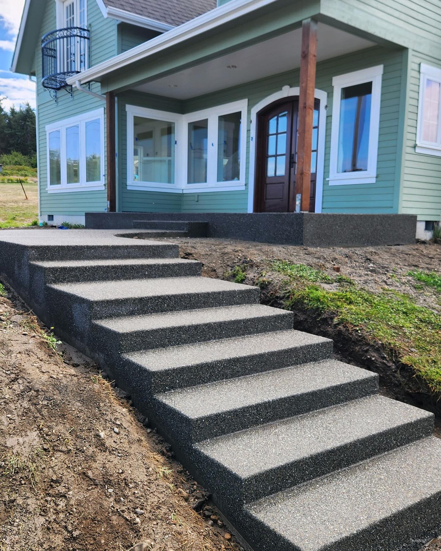 house with concrete driveway